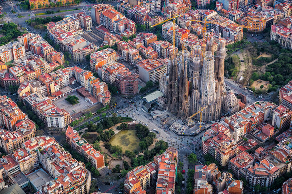 Barcelona aerial view, Eixample residential district and Sagrada Familia Basilica, Spain