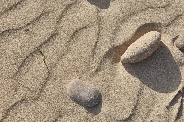 Textur des vom Wind eingeebneten Sandes mit Kieselsteinen # 7 — Stockfoto