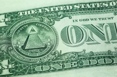 Bir dolarlık banknotta her şeyi gören göz, Masonluğun sembolü.