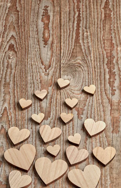 Different Size Heart Figures Wooden Background — Stock Photo, Image