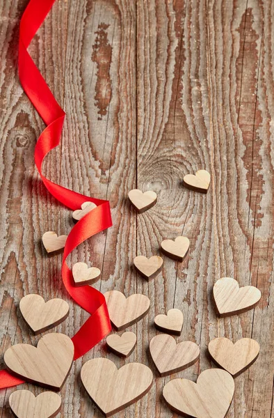 Different Size Heart Figures Red Ribbon Wooden Background — Stock Photo, Image
