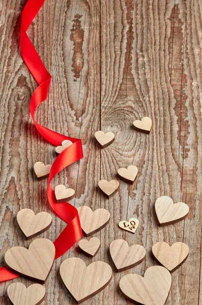 Different Size Heart Figures Red Ribbon Wooden Background — Stock Photo, Image