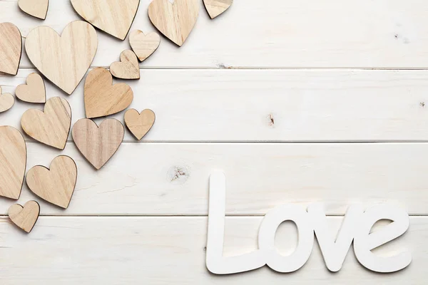 Different Size Heart Figures Love Sign White Wooden Background — Stock Photo, Image