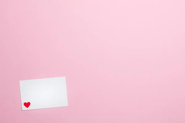 Pink empty background with white love letter