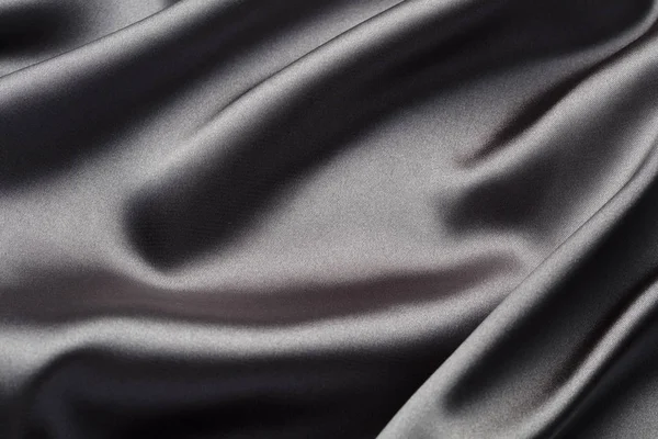 İpek dalgaları ile soyut, zarif arka plan dokusu, satan lüks bez kumaş