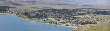 Panoramic view of the town Lake Tekapo in the South Island of New Zealand clipart