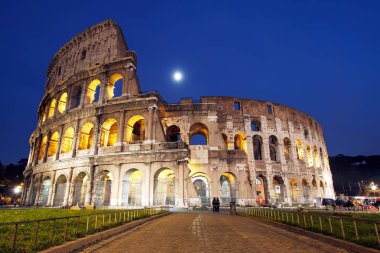 Night view of amazing Colosseum in Rome, Italy clipart