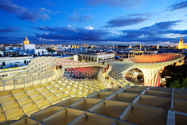 SEVILLE, SPAIN - NOVEMBER 19TH, 2012: Metropol Parasol in Plaza de la Encarnacion. J. Mayer H. architects, made from bonded timber with polyurethane coating.