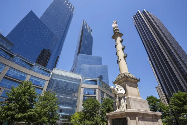 NEW YORK, USA - MAY 24TH, 2015: Columbus Circle, completed in 1905 and renovated a century later. The landmark traffic circle is featured in several films and other media.