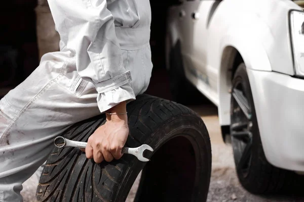 Selective Focus Hands Professional Mechanic Uniform Holding Wrench Tire Repair — Stock Photo, Image