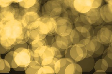Soyut altın bokeh ışıklar arka plan bulanık. Ufuk parlak ışık.