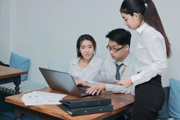 Teamwork business concept. Group of Asian people working with laptop  together in modern office. Selective focus and shallow depth of field. —  plan, discussion - Stock Photo | #214264390