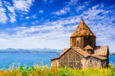 Scenic view of an old Sevanavank church in Sevan in Armenia clipart