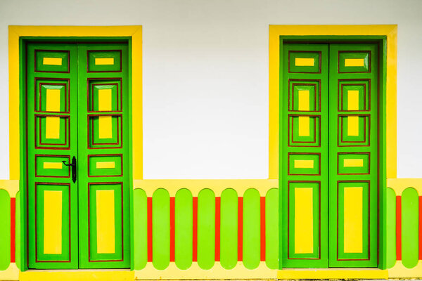 Colorful door of colonial building in the city of Filandia, Colombia