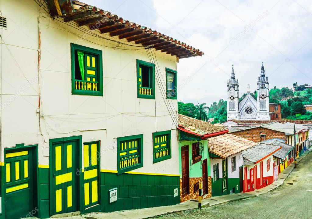 View on colonial buildings and white church in the colonial city of Jerico, Colombia