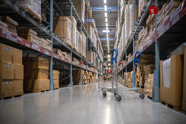 A cart in warehouse aisle in an IKEA store — Stock Photo, Image