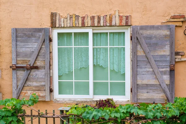 Antique window in the old town — Stock Photo, Image