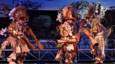 Bergamo, Italy - June 1, 2018: The TUFI group performs in traditional songs and dances of Papua New Guinea, the tribe performed at the festival LO SPIRITO DEL PIANETA at Chiuduno. Brambilla Simone Live News photographer clipart