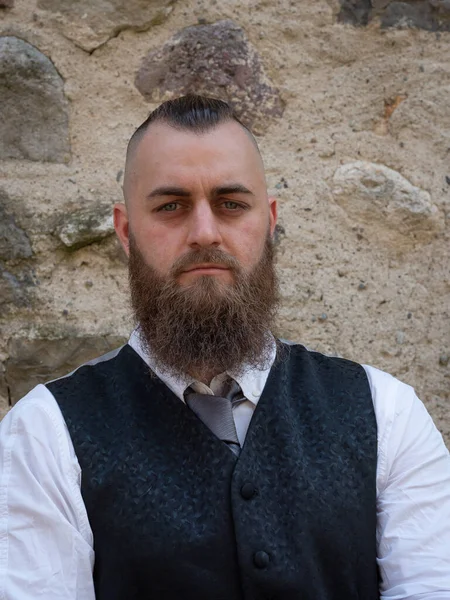 Man Long Beard Wears Dark Elegant Suit Posing Front Stone — Stock Photo, Image