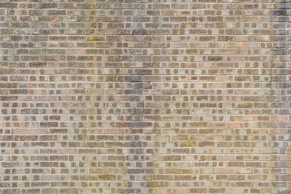bir Ingiliz binasının tipik kırmızı tuğla duvar. bir Londra tarzı tuğla cephe.