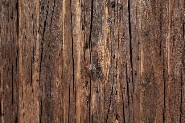 Textura y fondo de una madera marrón muy antigua . —  Fotos de Stock