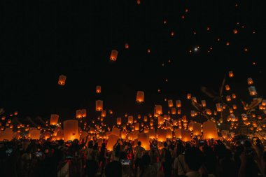 Floating lantern in night Chiang mai Thailand clipart