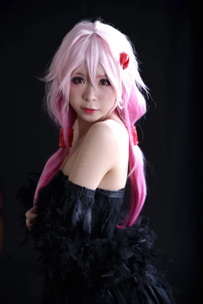 Portrait of Japan anime cosplay girl isolated in black background