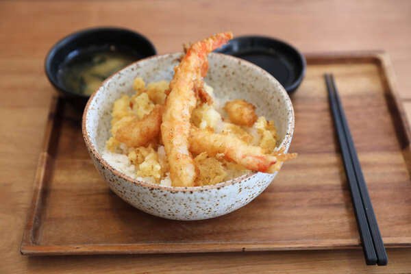 Tempura donburi , Fried shrimp tempura on rice japanese food on wooden table