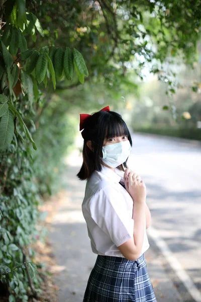 Asian School Girl With Mask In Urban City With Tree Background Stock Images Page Everypixel Asian School Girl With Mask In Urban City With Tree Background Stock Images Page Everypixel