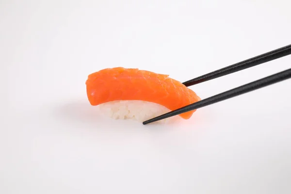 Salmon Sushi Chopsticks Japanese Food Isolated White Background — Stock Photo, Image
