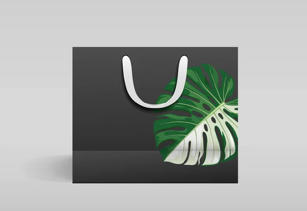 Zwarte Papieren Zak Voorzijde Ontwerp Met Monstera Blad Print Template — Stockvector