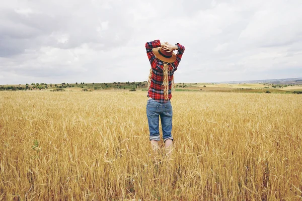 Back View Blonde Woman Wearing Hat Standing Yellow Field Wheat — Stok Foto