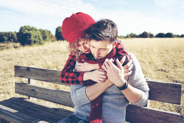 Happy Young Couple Love Hugging Sunbathing Wooden Bench Meadow Autumn — Stock Photo, Image