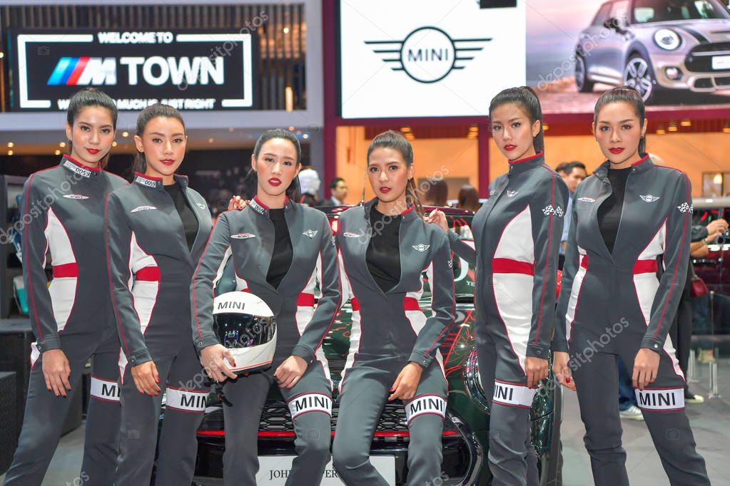 NONTHABURI - NOVEMBER 28:  Unidentified model with Mini Cooper car on display at The 35th Thailand International Motor Expo on November 28, 2018 in Nonthaburi, Thailand.