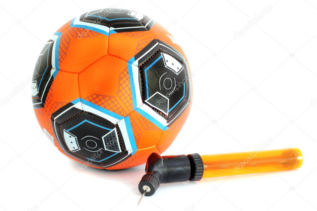 Soccer ball and pump