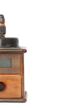 Beyaz bir arka plan üzerinde el ile kahve değirmeni. Antiquary.