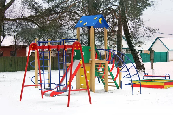 Children Swing Winter Playground Stock Photo
