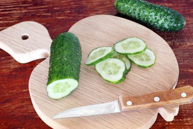 Sliced cucumbers on the board