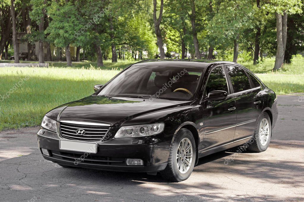Kiev, Ukraine - August 6, 2018: Beautiful black Hyundai car in the background of a beautiful forest