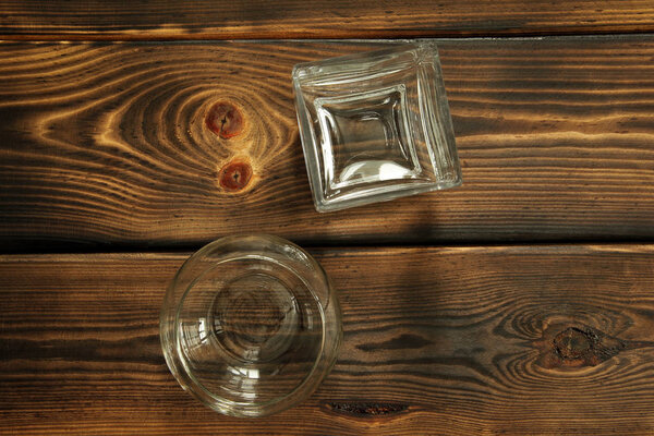 Glass vase on wooden background