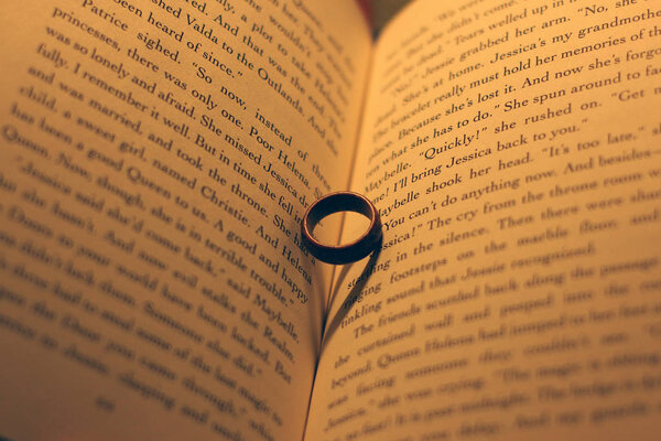 The ring in the book. Abstract photo