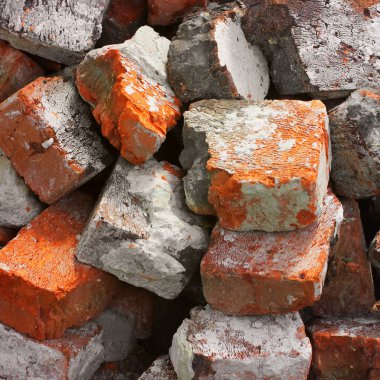 Tuğladan yapılmış arka plan. Şantiyede tuğlalar