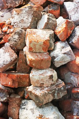 Tuğladan yapılmış arka plan. Şantiyede tuğlalar