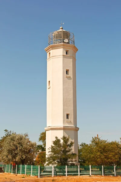 Lighthouse near the sea. Lighthouse on the island. — Stock Photo, Image