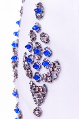 Parlak renklerin payetleri ve payetleri ile kumaş. Moda glitter kumaş, payetler. Parlak yüzey