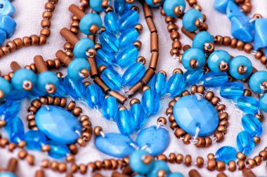 Parlak renklerin payetleri ve payetleri ile kumaş. Moda glitter kumaş, payetler. Parlak yüzey