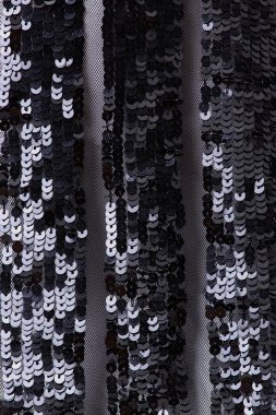 Parlak renklerin payetleri ve payetleri ile kumaş. Moda glitter kumaş, payetler. Parlak yüzey