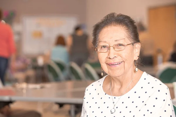 Hispanic Woman Busy Senior Center — 스톡 사진