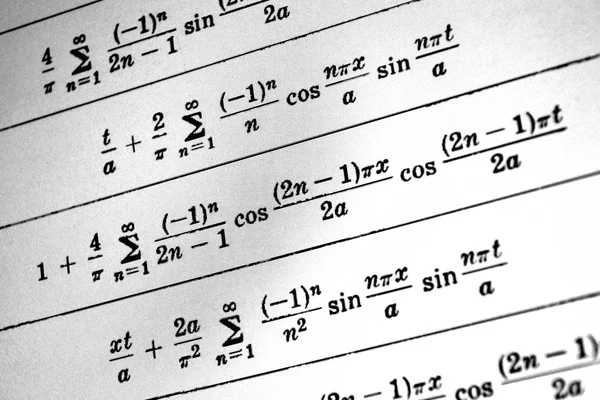 Large number of mathematical formulas on a white background