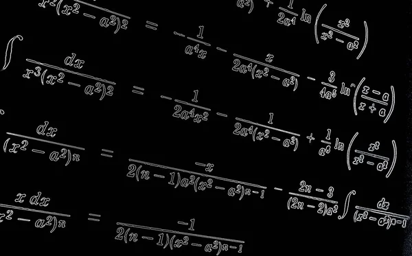 Large number of mathematical formulas neon on a black  background